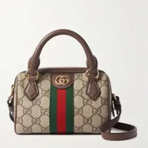 Wine-stained Gucci clutch restored by Perfect Leather Care
